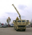 canadian_mercedes_actros_ahsvs__front_with_mh_crane_in_use_at_mercedes_facility_154.jpg