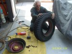 375 Jeep wheels getting tires mounted.jpg